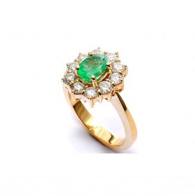 Yellow gold ring with diamonds  1.15 ct and emerald 0.81 ct