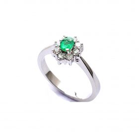 White gold ring with diamond 0.27 ct and emerald 0.18 ct