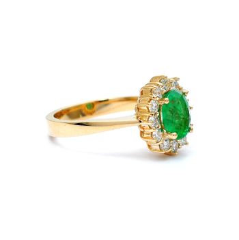 Yellow gold ring with diamonds 0.54 ct and emerald 1.16 ct